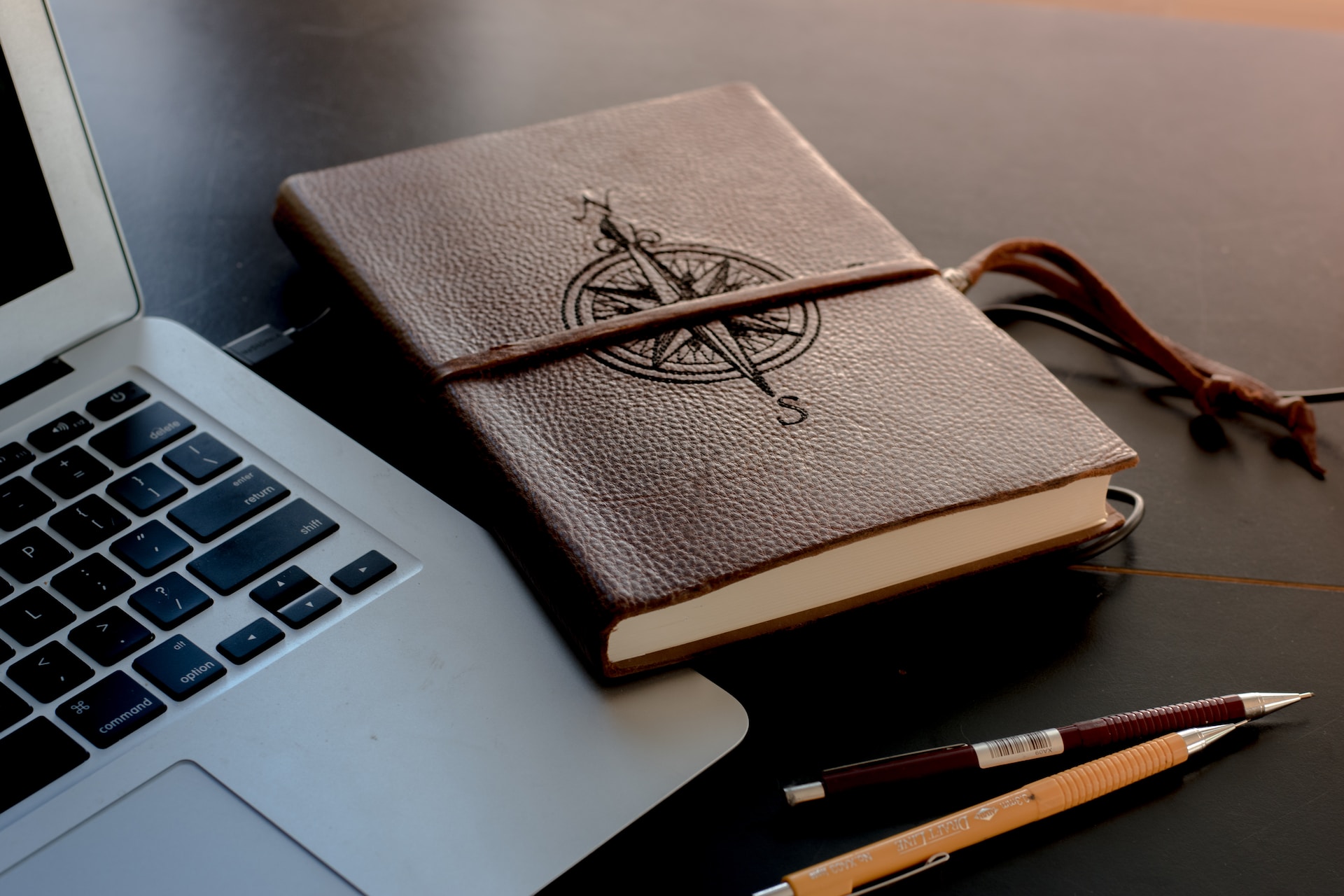 a picture of a notebook/compass